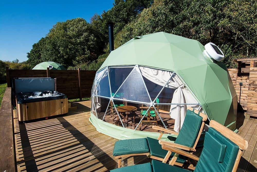 Luxury glamping dome with a hot tub